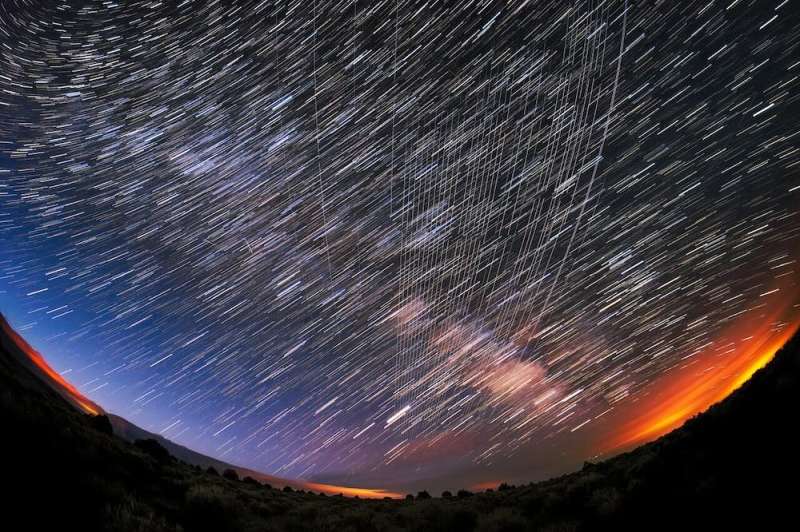Satellites and space junk may make dark night skies brighter, hindering astronomy and hiding stars from our view